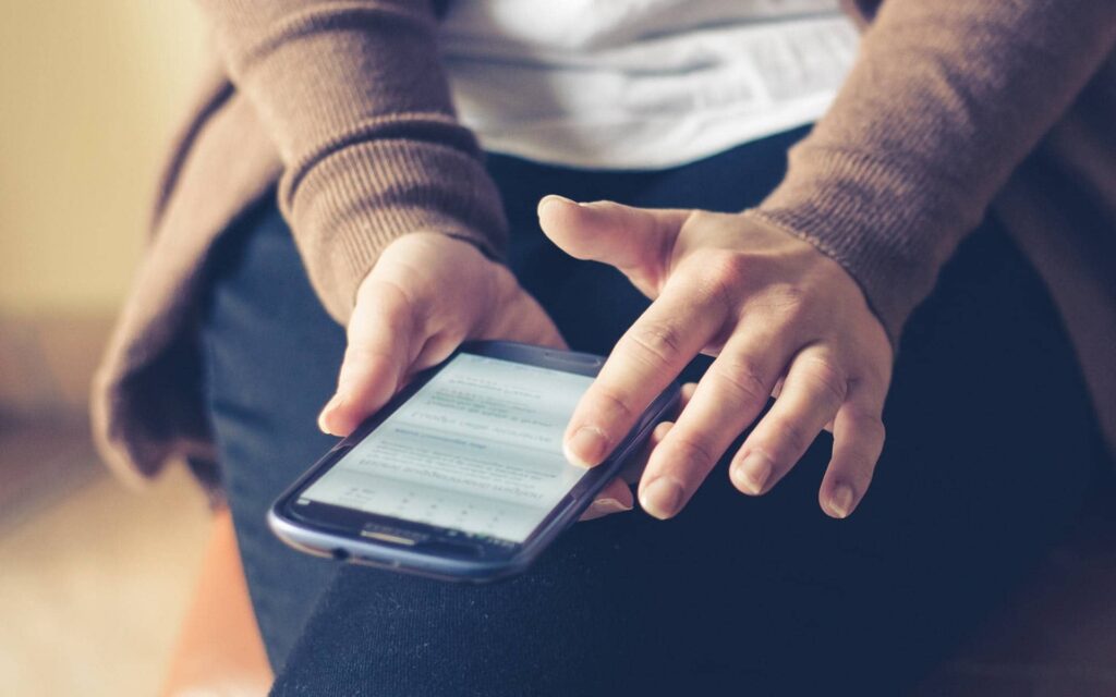 Person using a mobile phone.